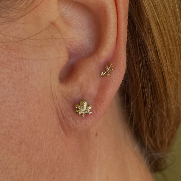 Pricking Thumbs Tattoo & Piercing