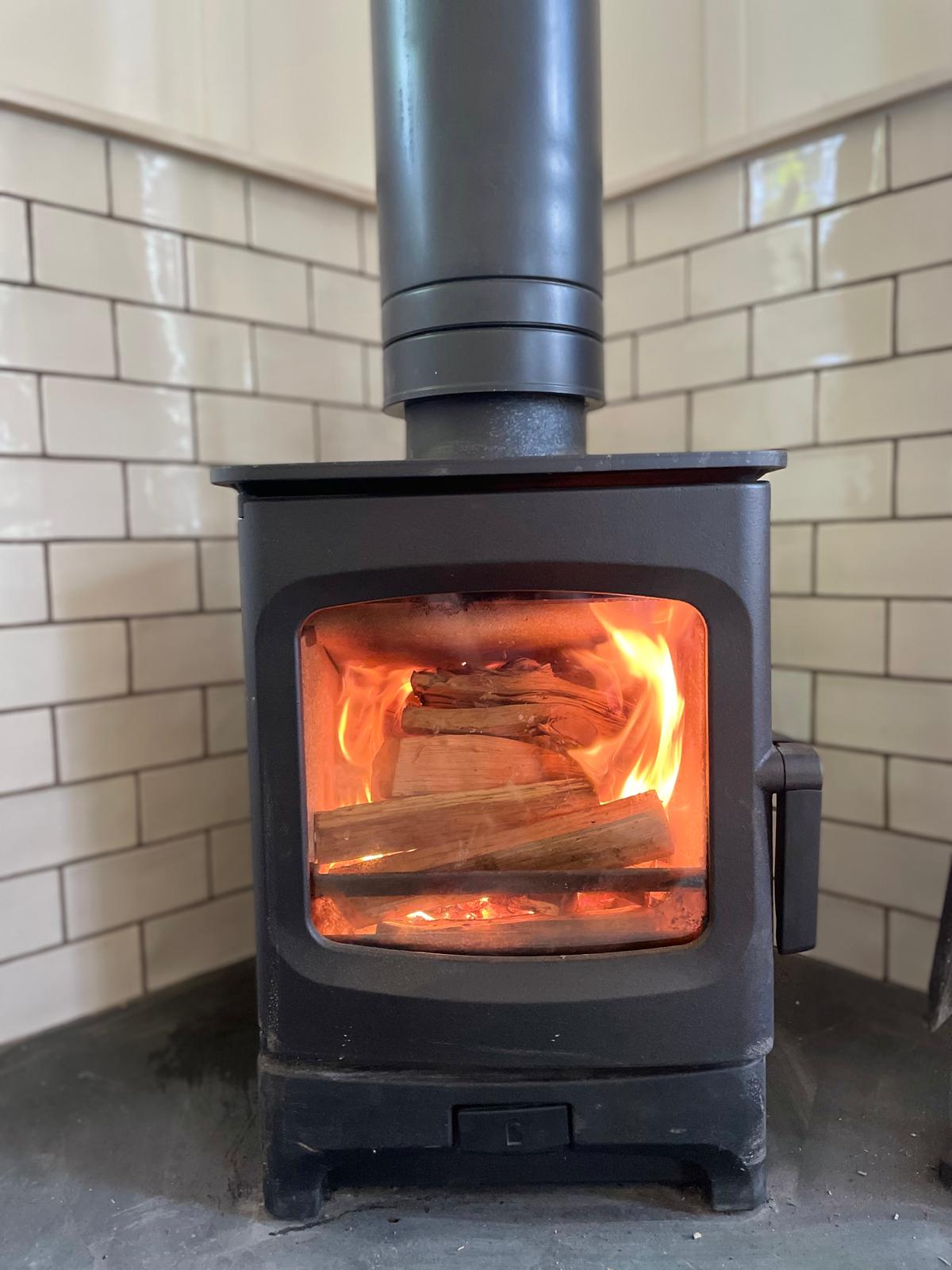 Cosy Off-Grid Warmth: Wood-Burning Stove Feature